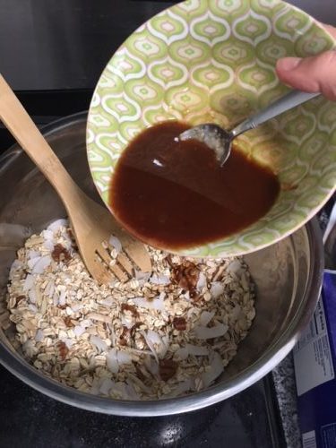 granola mixing up ingredients