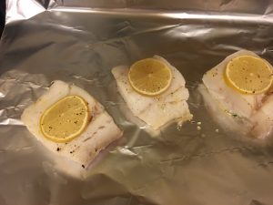Broiled cod with lemon olive caper sauce-prepped on foil pan